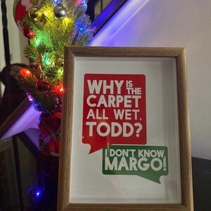 Funny Christmas Movie Quote Wall Art – “Why Is the Carpet All Wet, Todd?” Frame